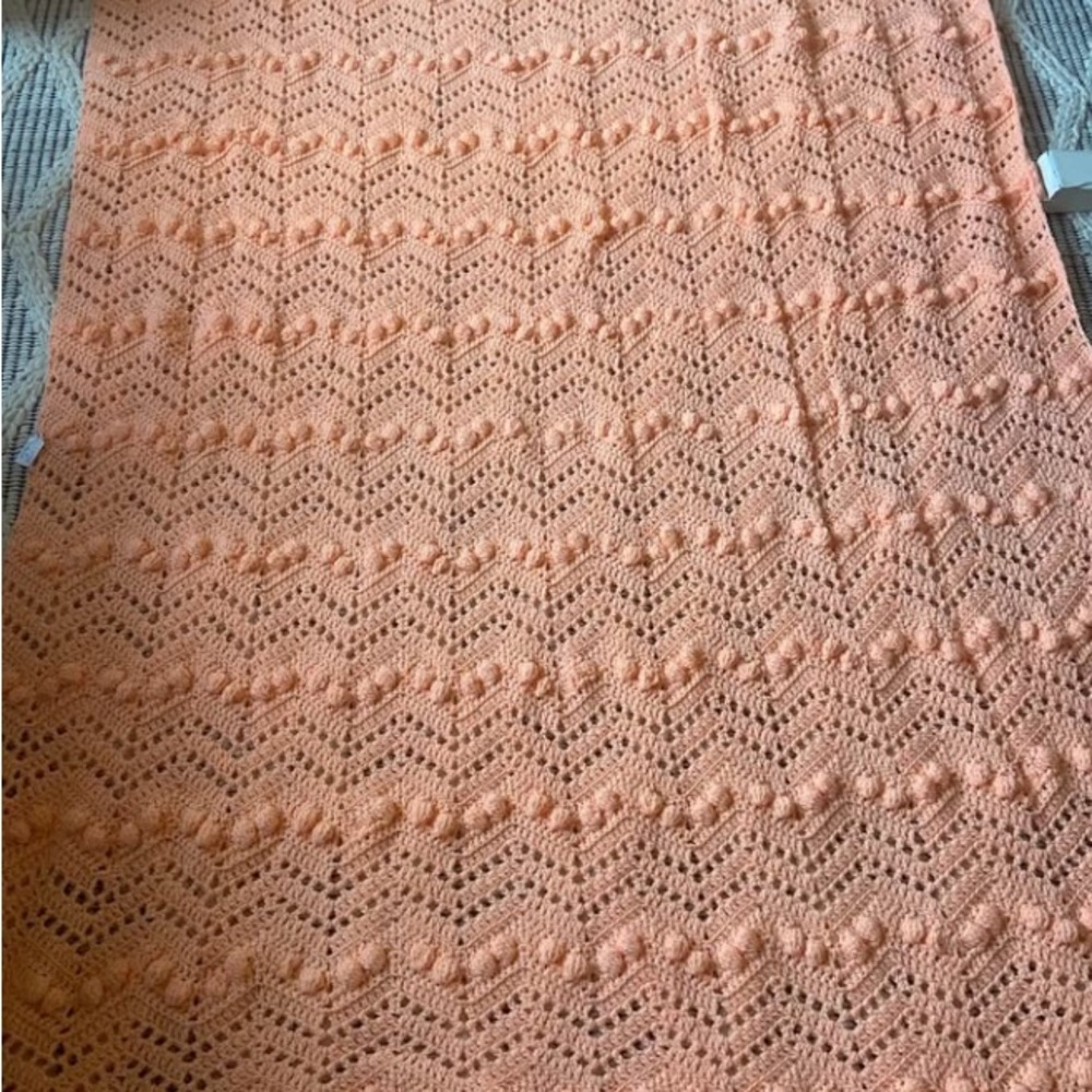 Bright peach handmade crochet blanket